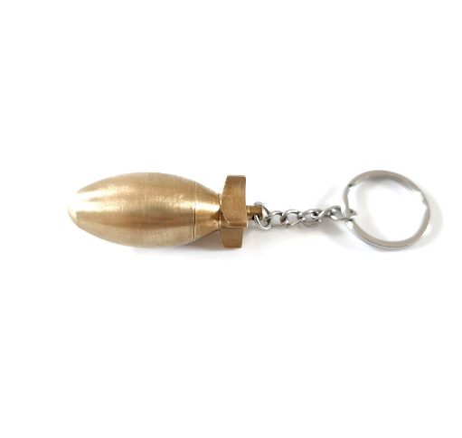 A Brass Bomb Shaped Medicine Bottle Keychain