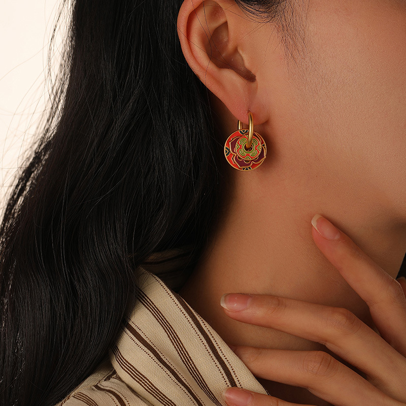 Lady Wearing Enamelled Drip Oil Ear Clasp