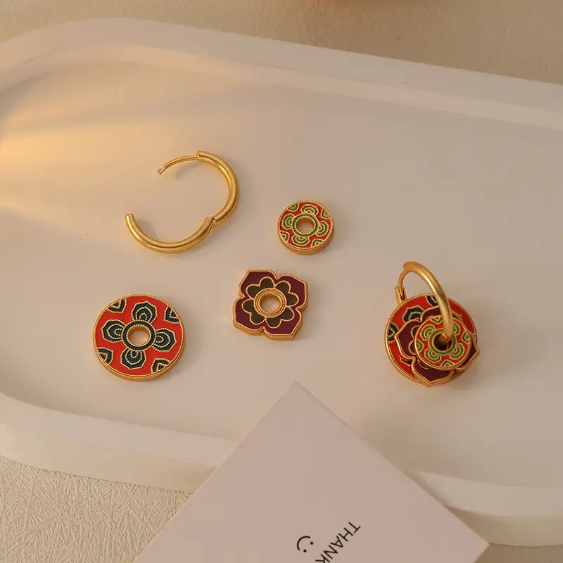 Lady Wearing Enamelled Drip Oil Ear Clasp