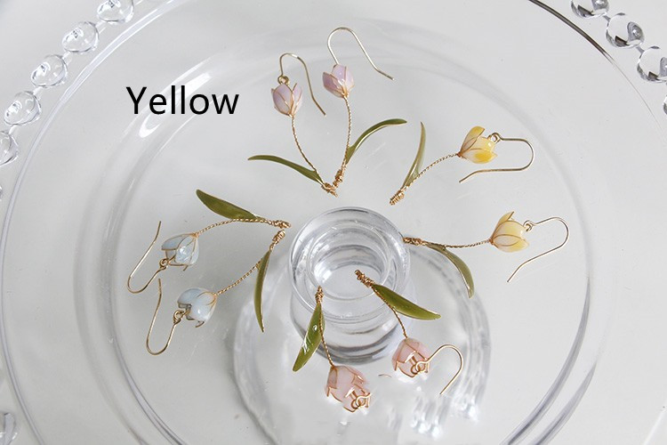 Yellow spiral ear clip
