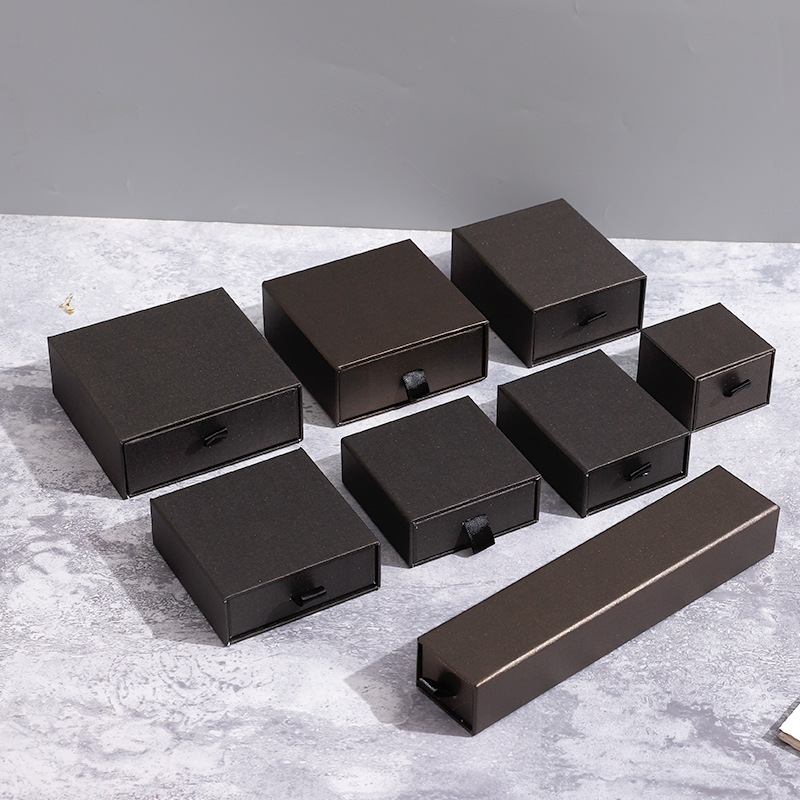 Custom Jewelry Packaging Box for Storage and Gifting. Product Information: Product type: drawer type jewelry box Material: paper Style: Drawer type, pull-out type Applicable scene: indoor Applicable people: female Purpose: Storage Size Information: Differ