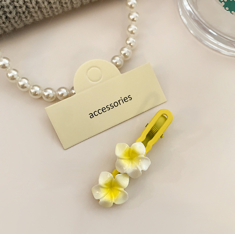 Double frangipani hairpin