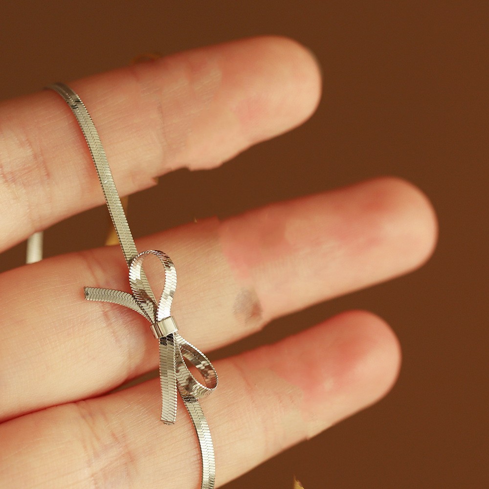 Titanium Steel Bow Snake Bones Chain Niche