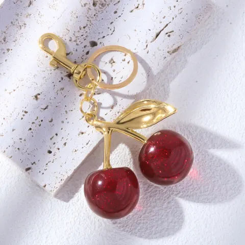 A Pair of Red Cherry Crystal Bag Glitter Keychain