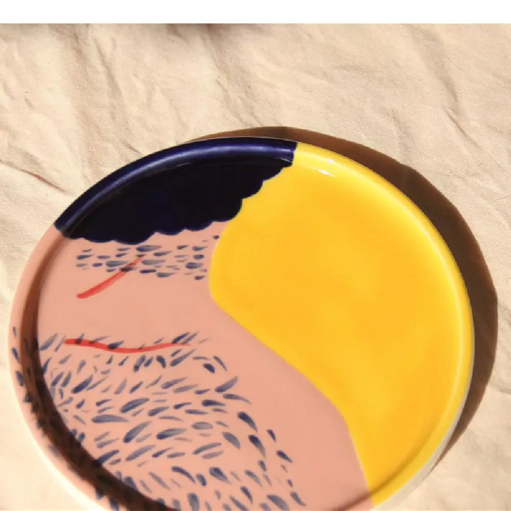 A Man's Ceramic Fruit Plate Released Into The Air