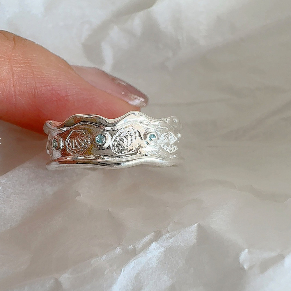 Ocean's Daughter Blue Zircon With Diamond Embossed Shell Ring
