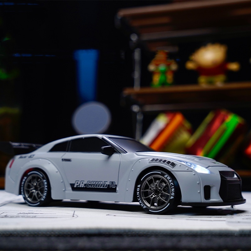 Model car on a dark background with colorful lights