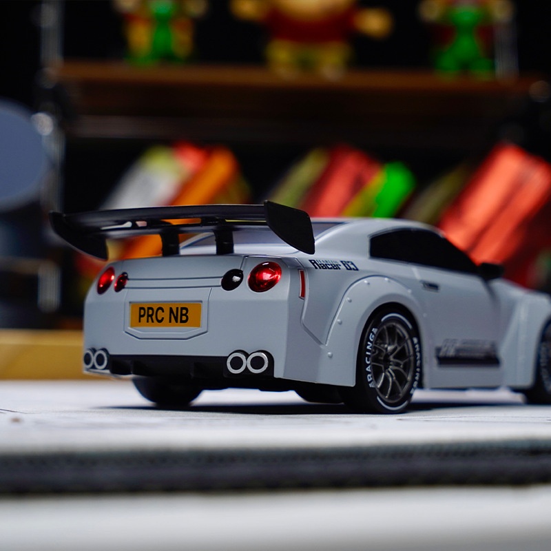 Model car with a visible license plate 'PRC NB' on a blurred background