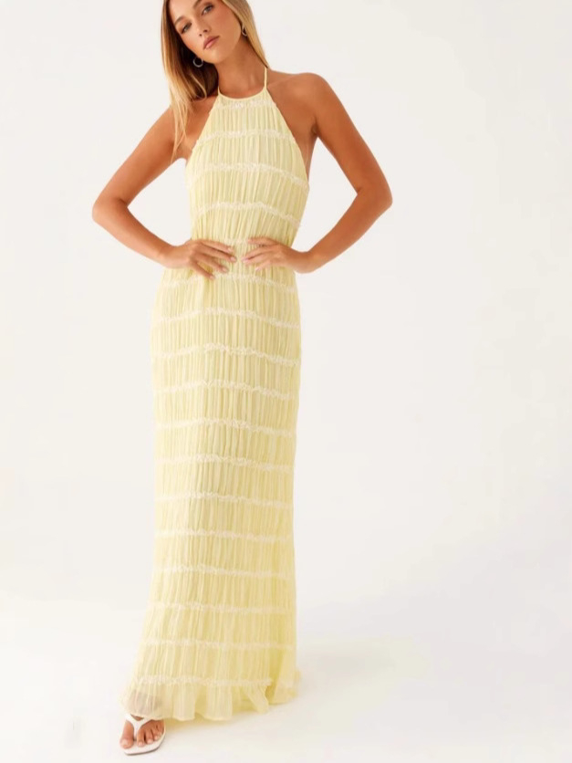 فستان خاص من القماش المخطط المطوي بدون ظهر