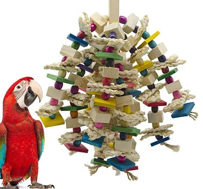 Parrots Gnaw On Toys Made Of Corn Husk And Wood - Toy Bird