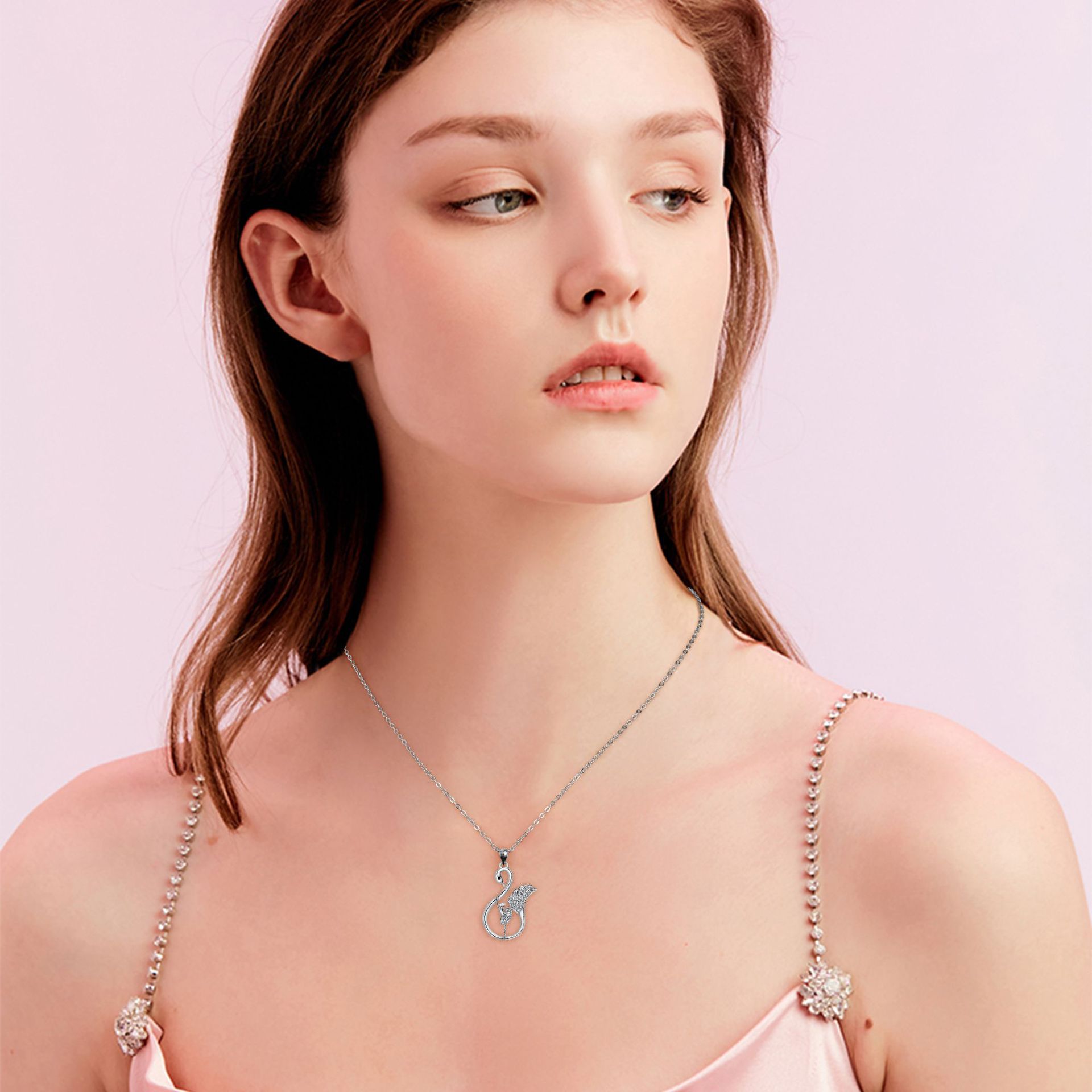 White Swan Pendant Necklace On The Dance Floor