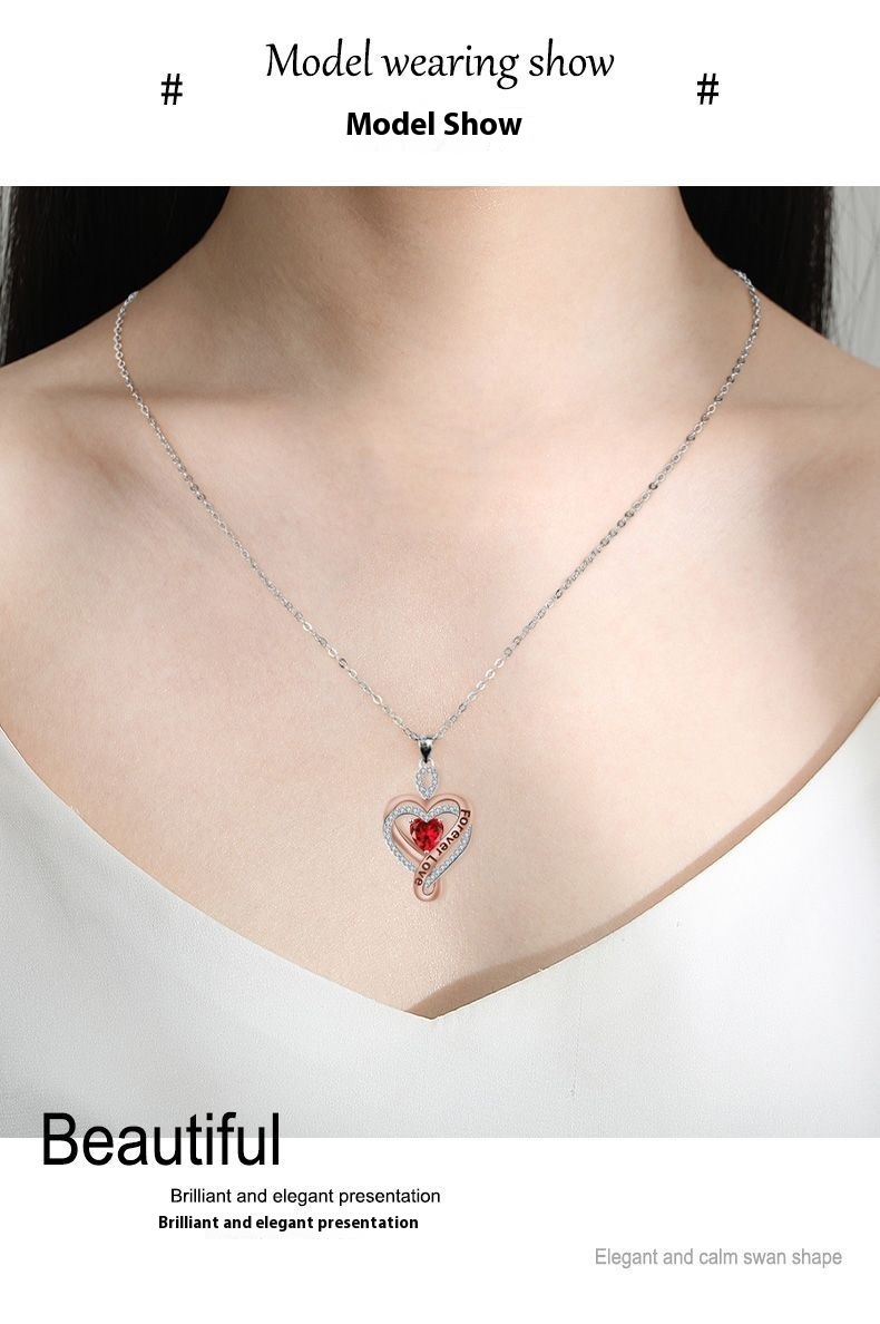 Herzanhänger-Halskette mit diamantähnlicher Facettierung an einer Kreuzkette