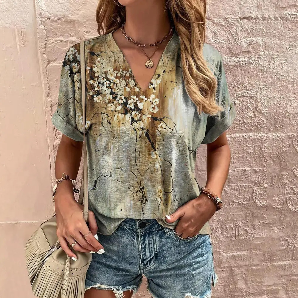 Feel radiant and free in our V-Neck Boho T-Shirt for Women – perfect for embracing your bohemian spirit in everyday comfort. Unique Features of This V-Neck Boho T-Shirt for Women Flattering V-neckline that adds a feminine touch and elongates your silhouette effortlessly Flowy relaxed fit ideal for layering or tucking into high-waisted skirts and jeans Lightweight high-quality fabric that feels soft and breathable against the skin Boho-inspired patterns and colors designed with earthy tones, floral prints, and indie-chic details Short sleeves with a natural drape that enhance the carefree, bohemian vibe Benefits of the V-Neck Boho T-Shirt for Women Versatile for every season – style it with jeans, shorts, or a maxi skirt for a complete boho chic outfit Effortless comfort for daily wear, music festivals, beach strolls, and cozy cottagecore mornings Timeless bohemian aesthetic that blends gypsy, hippie, and indie style for earthy, soulful looks Pros of the V-Neck Boho T-Shirt for Women Available in multiple prints and earthy tones to match your individual boho style Easy to pair with other boho staples like kimonos, layered necklaces, and wide-brim hats Great for creating gypsy-inspired, romantic cottagecore, or carefree hippie outfits Characteristics of the V-Neck Boho T-Shirt for Women Designed for the modern boho woman who values comfort, authenticity, and personal expression Ideal for layering with cardigans or jackets during cooler months without adding bulk Captures the essence of bohemian freedom while offering structure and a flattering shape Care Guide for Your V-Neck Boho T-Shirt for Women Hand wash or machine wash cold with similar colors Line dry or tumble dry low to preserve shape and print Do not bleach or iron directly over printed areas Sizing Tips for the V-Neck Boho T-Shirt for Women Our sizes run slightly smaller than standard sizing – choose a size up if you're between two sizes Refer to our size guide to make sure you pick the best fit for your body For a true boho flowy look, sizing up may offer that relaxed aesthetic you love Still unsure? Reach out to us anytime at bohoharmony.store@gmail.com – we’re happy to help Why Choose This V-Neck Boho T-Shirt for Women? Free Worldwide Shipping Easy Returns Dedicated Customer Support Step into your wild, free, and feminine self with this earthy, boho-chic V-neck – your perfect everyday statement piece. Meta Description V-Neck Boho T-Shirt for Women – soft, flowy, bohemian-inspired tee with a flattering fit and earthy patterns for chic indie looks.