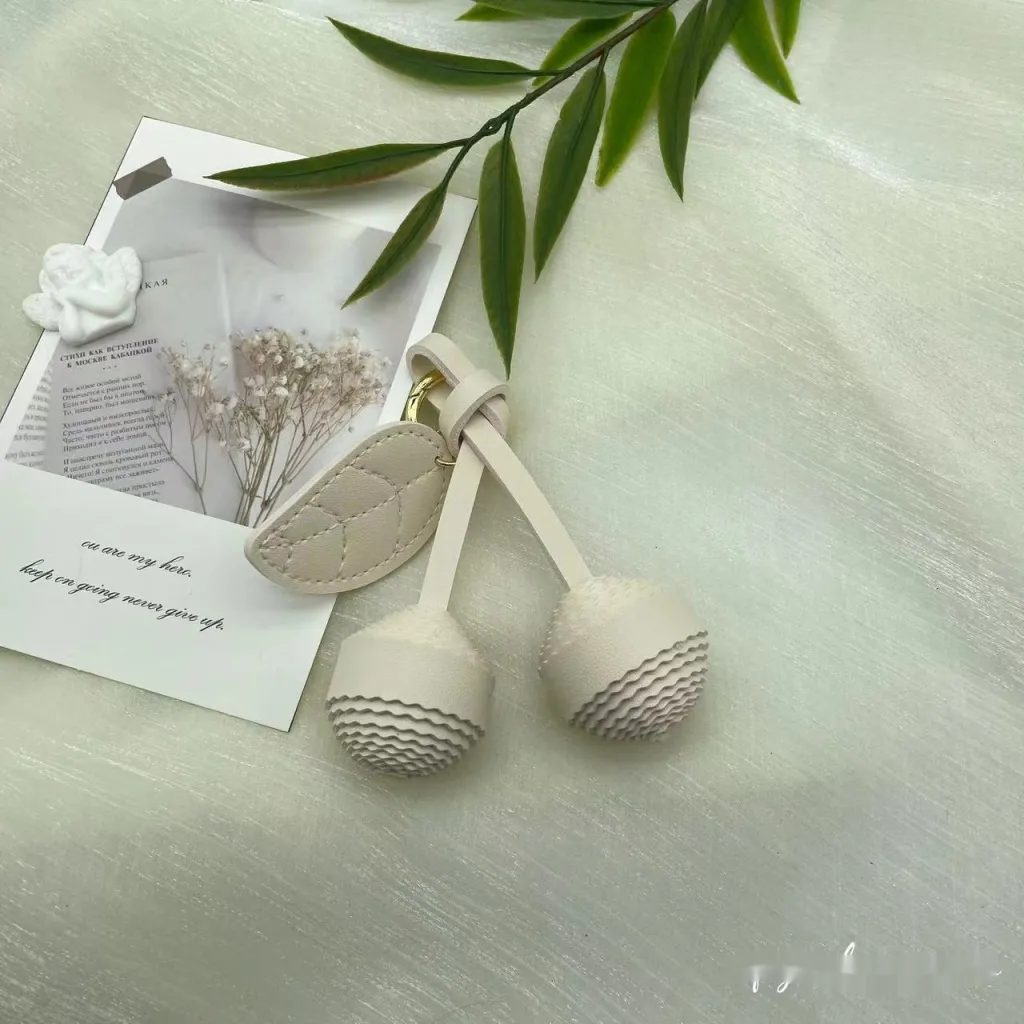 New Pu Cherry Fashion Cute Tree Leaf Woven Ball Keychain Exquisite Ornaments - White