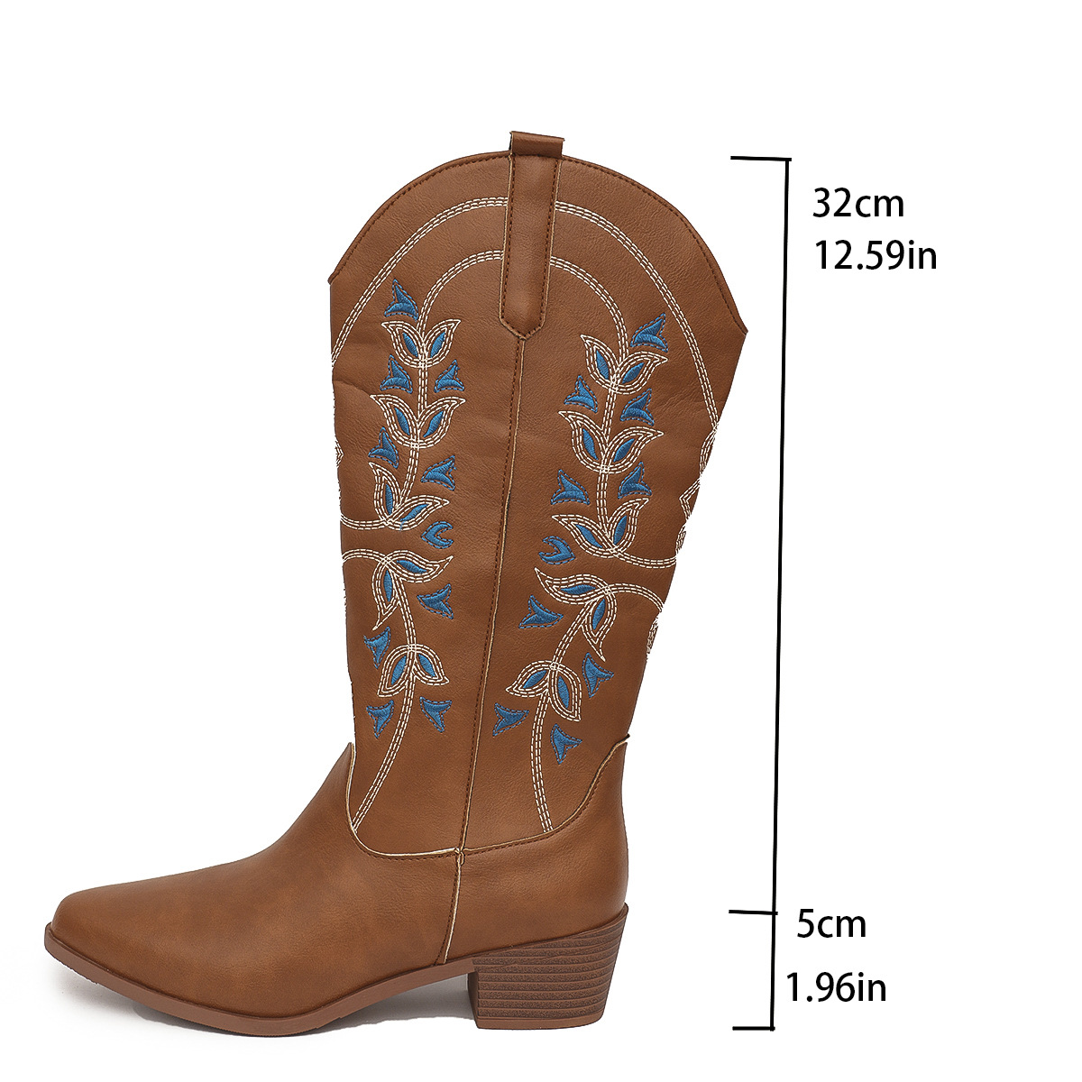 Women's cowboy boots close-up of embroidery on shaft with pointed toe and sturdy chunky heel for all-day wear