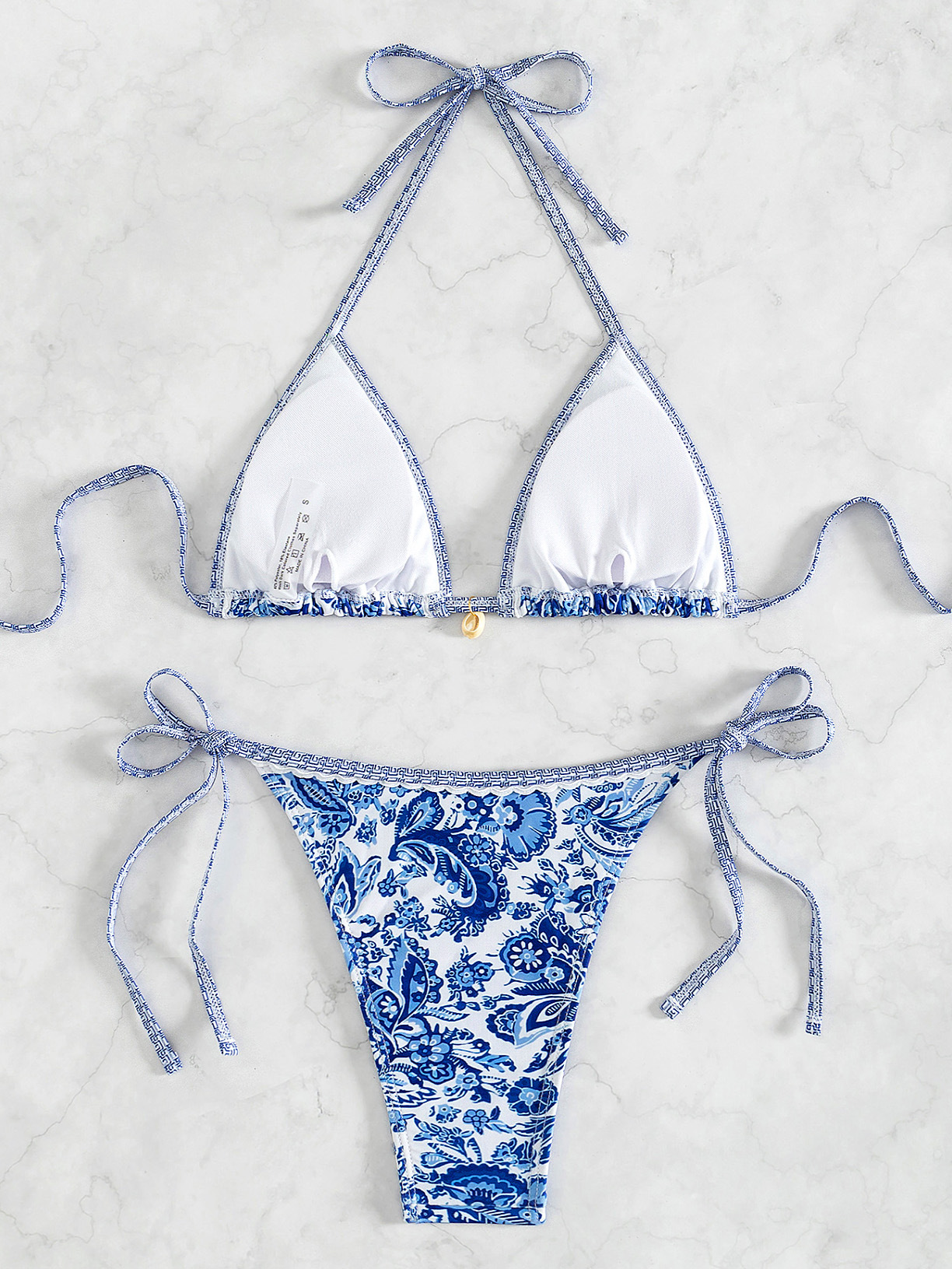 Boho Chic Printed Triangle Bikini Set with earthy patterns, flattering adjustable fit, and high-quality fabric—perfect for bohemian summer style.