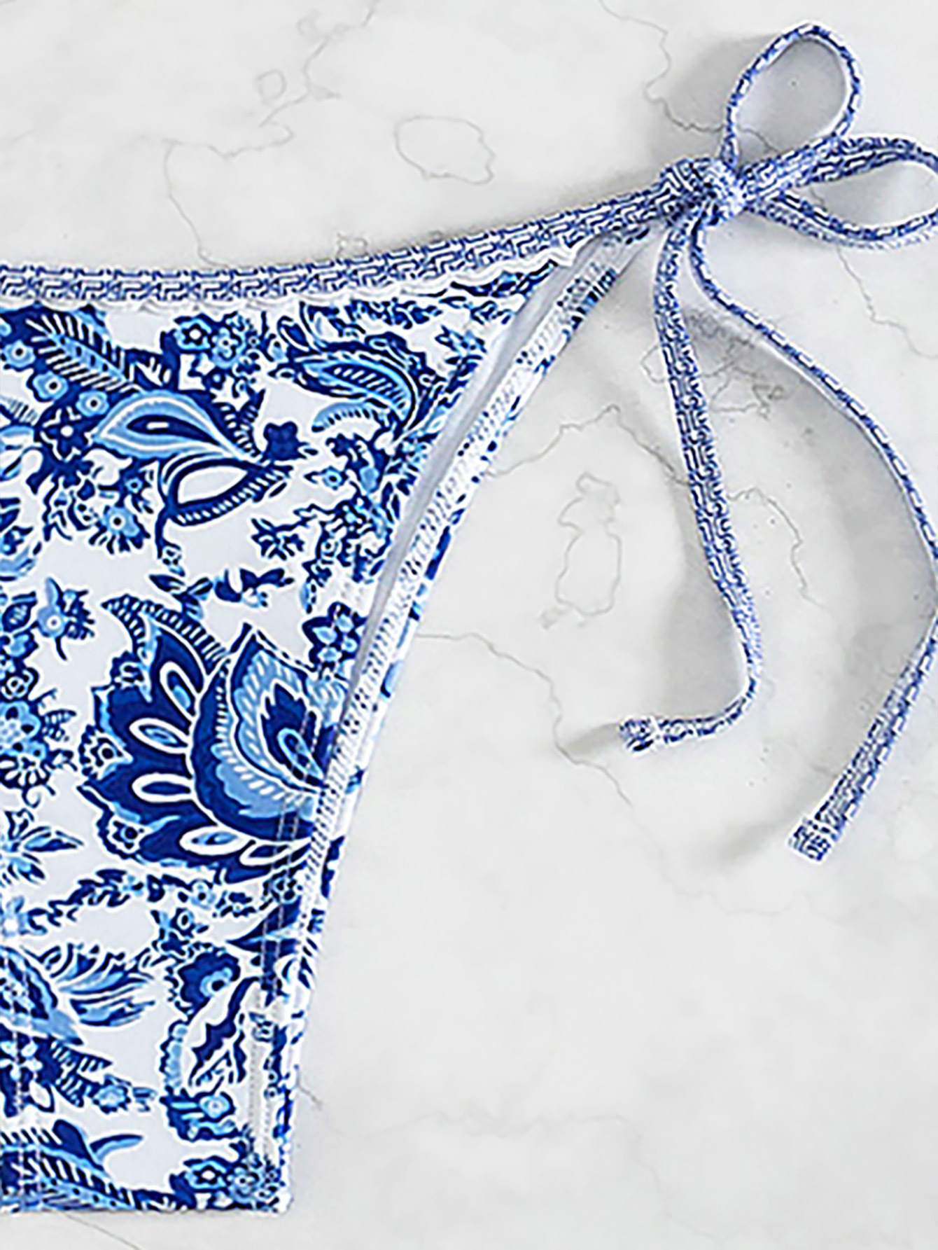 Boho Chic Printed Triangle Bikini Set with earthy patterns, flattering adjustable fit, and high-quality fabric—perfect for bohemian summer style.