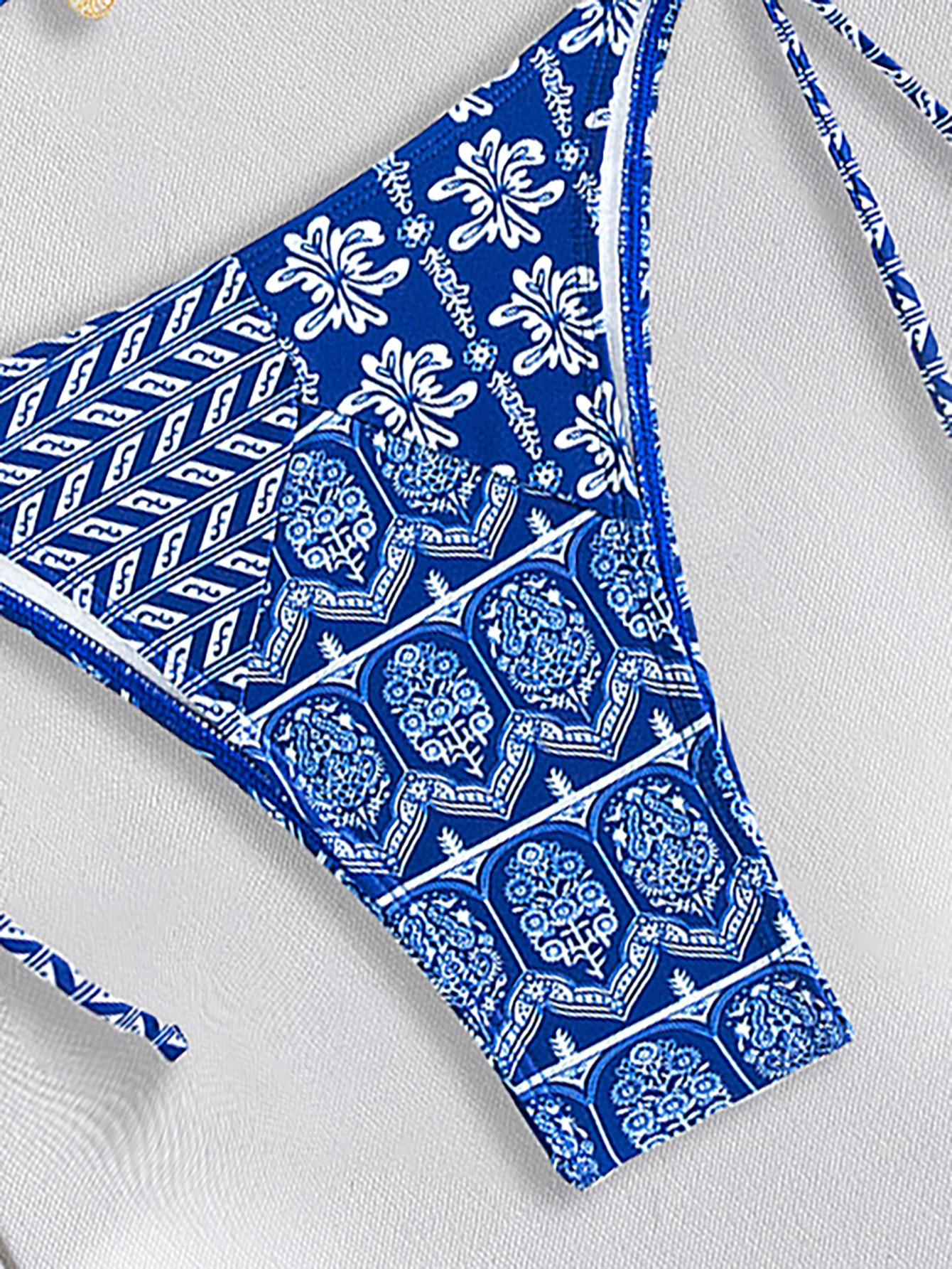 Boho Chic Printed Triangle Bikini Set with earthy patterns, flattering adjustable fit, and high-quality fabric—perfect for bohemian summer style.