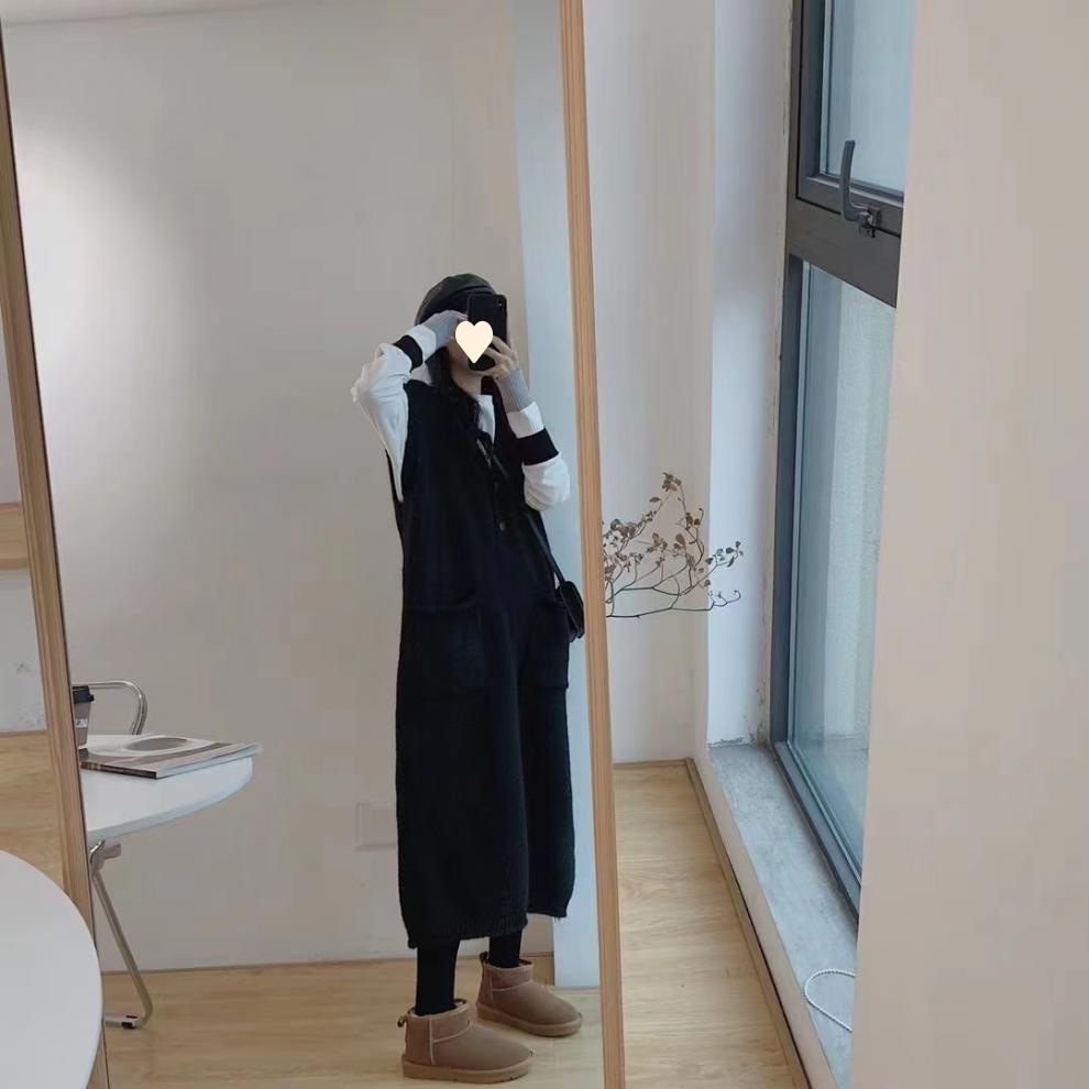 Petite Woman In A Vest Fur Coat And Skirt