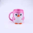 A Pink Penguin And Two Spoons