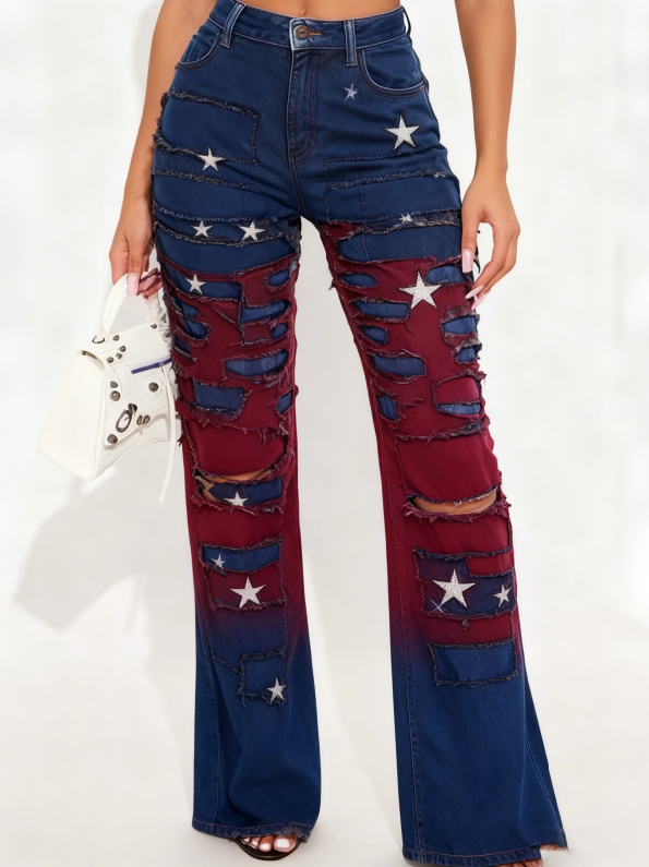 High-waisted two tone distressed wide leg denim jeans with a star-patterned gradient from deep blue to maroon.