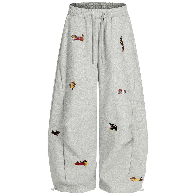 Dachshund embroidery close-up on men's casual sweatpants