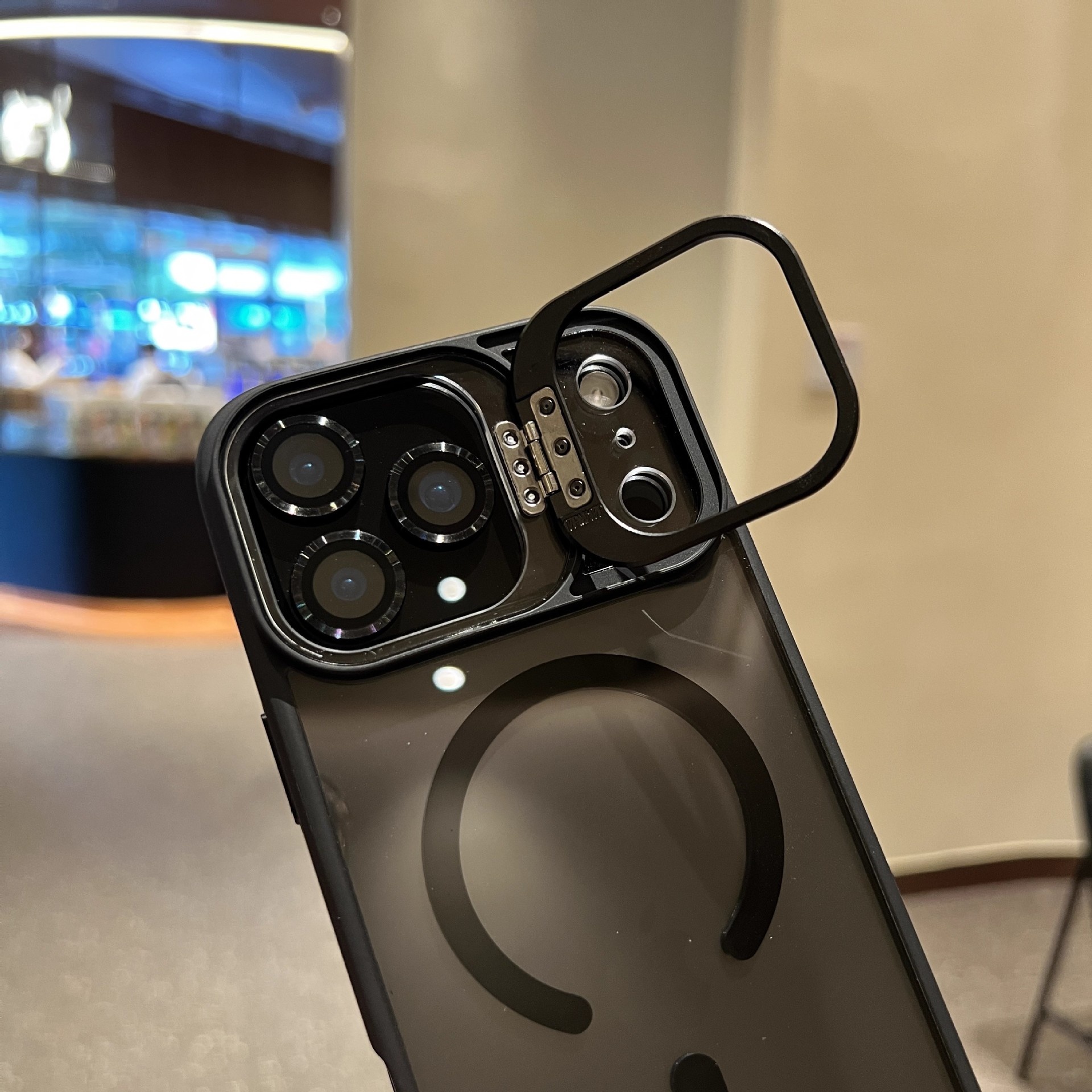 Phone Case With A Metal Lens Holder And Built-in Lens Protector