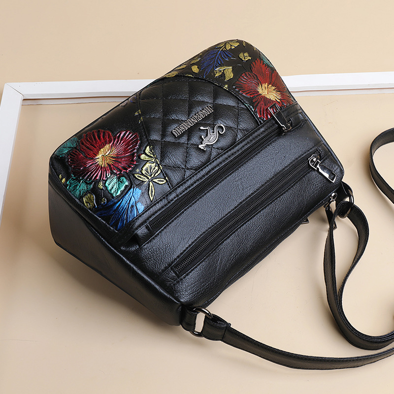 A Multi-layered Crossbody Bag With A Fashionable Large-capacity Embroidered Thread Design - Image 1