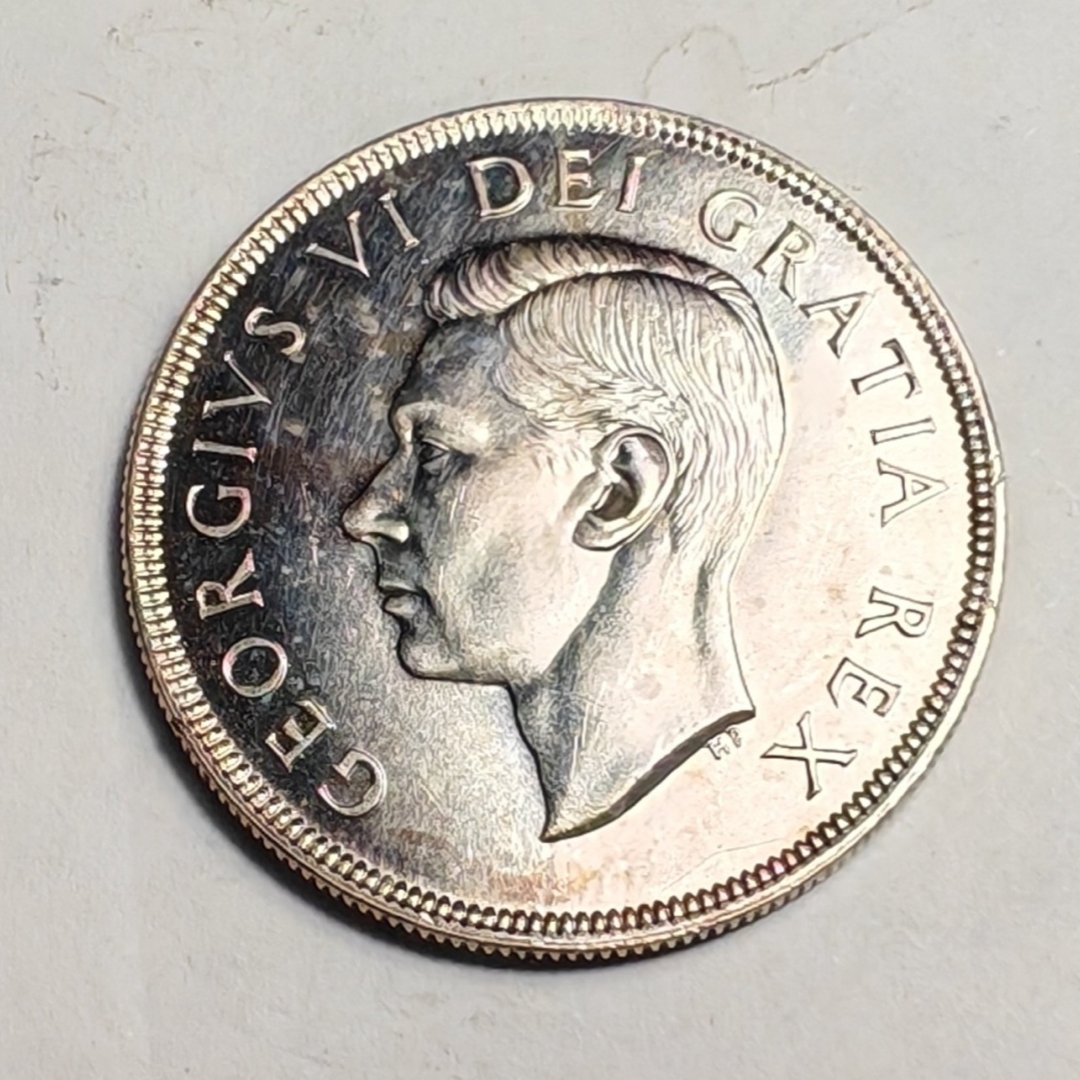 1949 Canadian 1 Silver Coin Featuring The Portrait Of King George VI