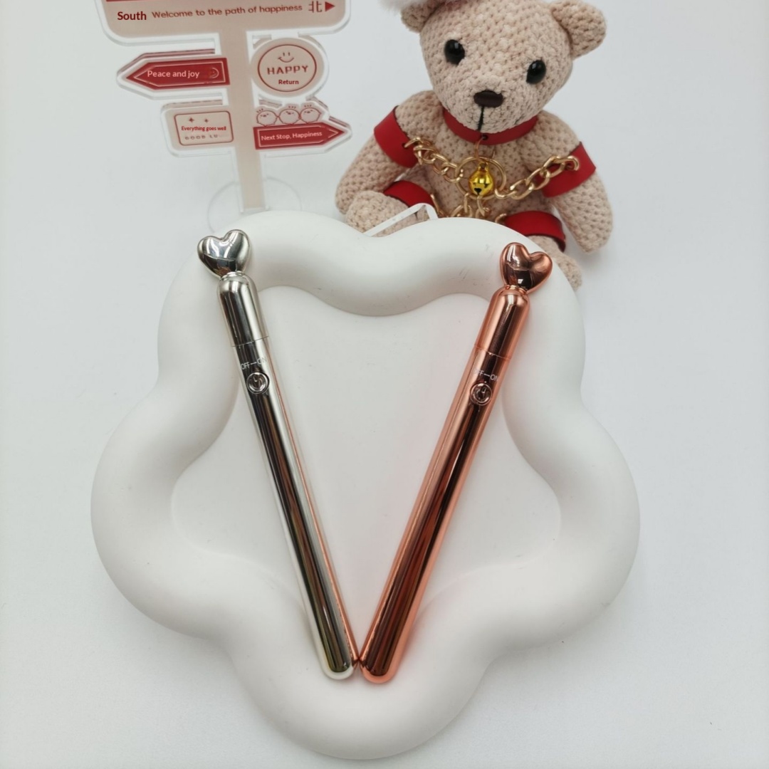 Womens Rose Gold Vibrating Massage Pen