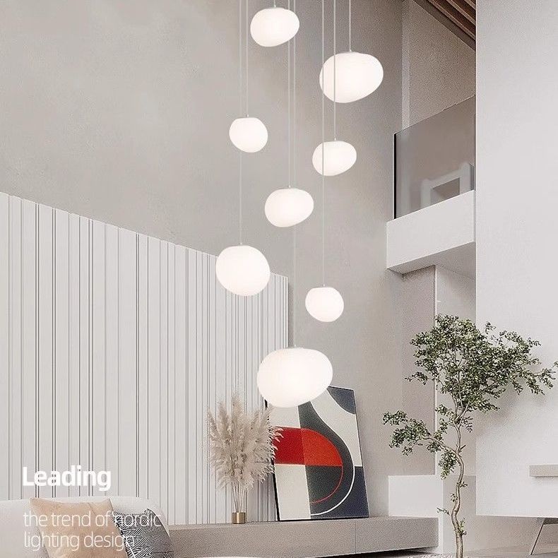 Creamy Pebble-Style Chandelier For A Double-Height Staircase