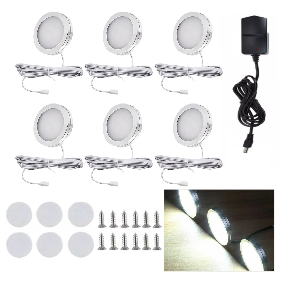 Six slim aluminium LED puck lights with a power adapter and connecting leads