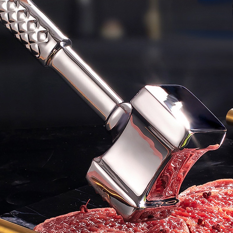 A Household Stainless Steel Meat Mallet Is Perfect For Tenderizing Steaks