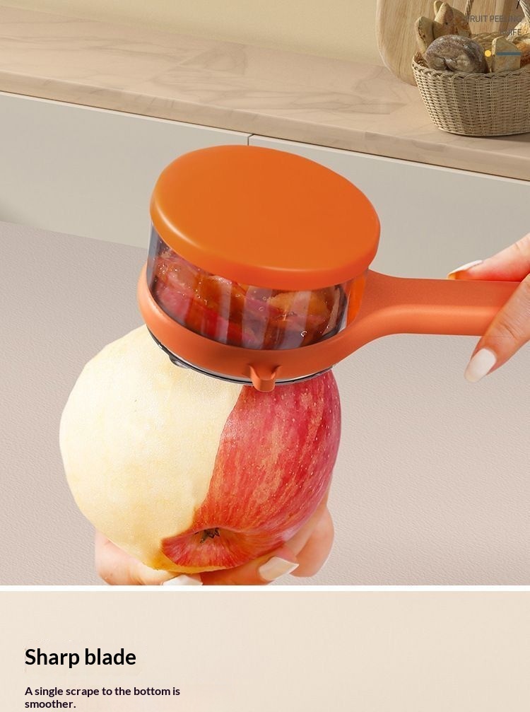 Peeler with fruit and vegetables on kitchen bench