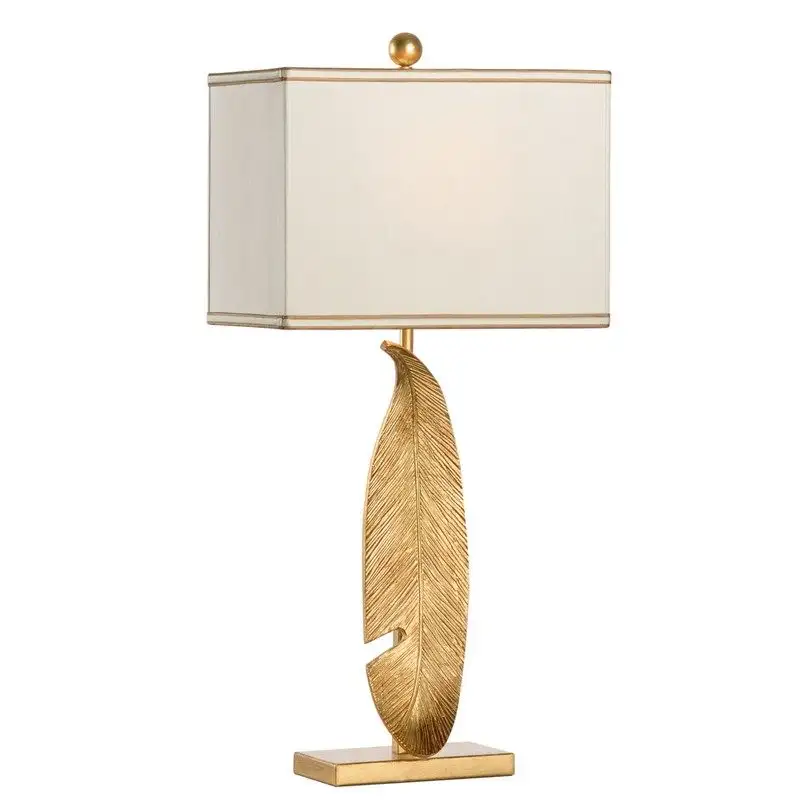 Postmodern Light-Luxury Modern Minimalist Table Lamp With Golden Leaf Design