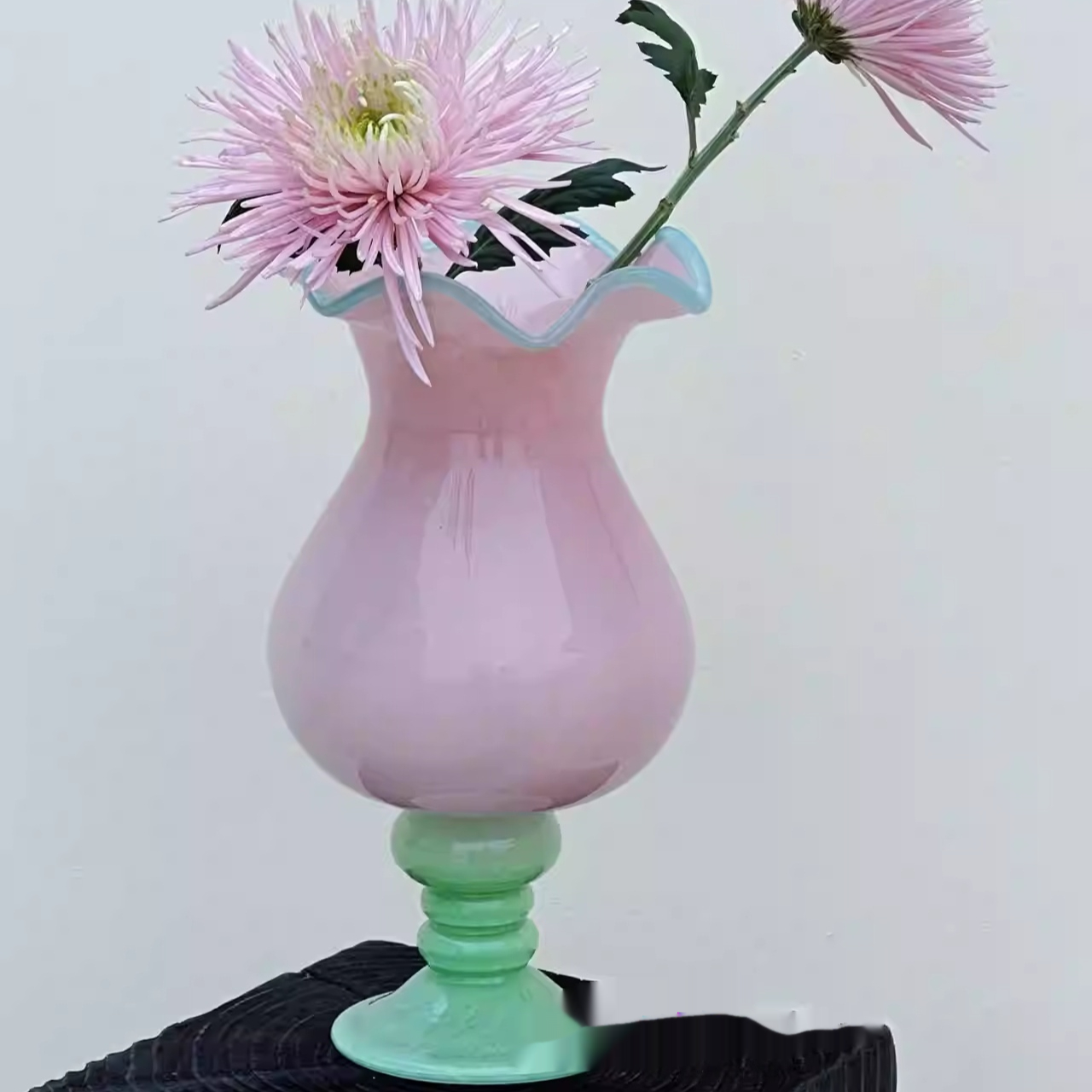 A Delicate Light Blue Stemmed Glass Vase With A Touch Of Freshness And Allure