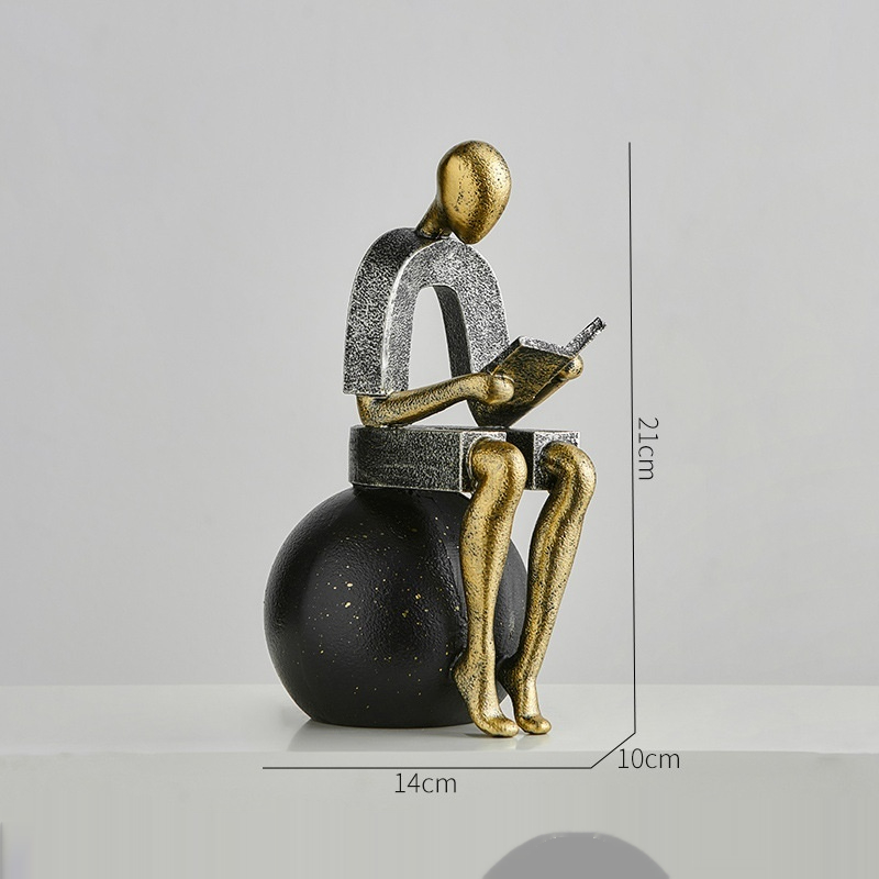 Abstract Resin Desk Ornament Of A Figure Reading And Pondering