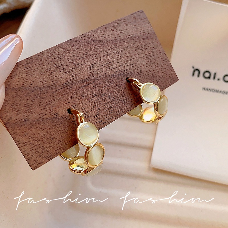 Trendy Cat-eye Stone Earrings For Women With A Designer Touch