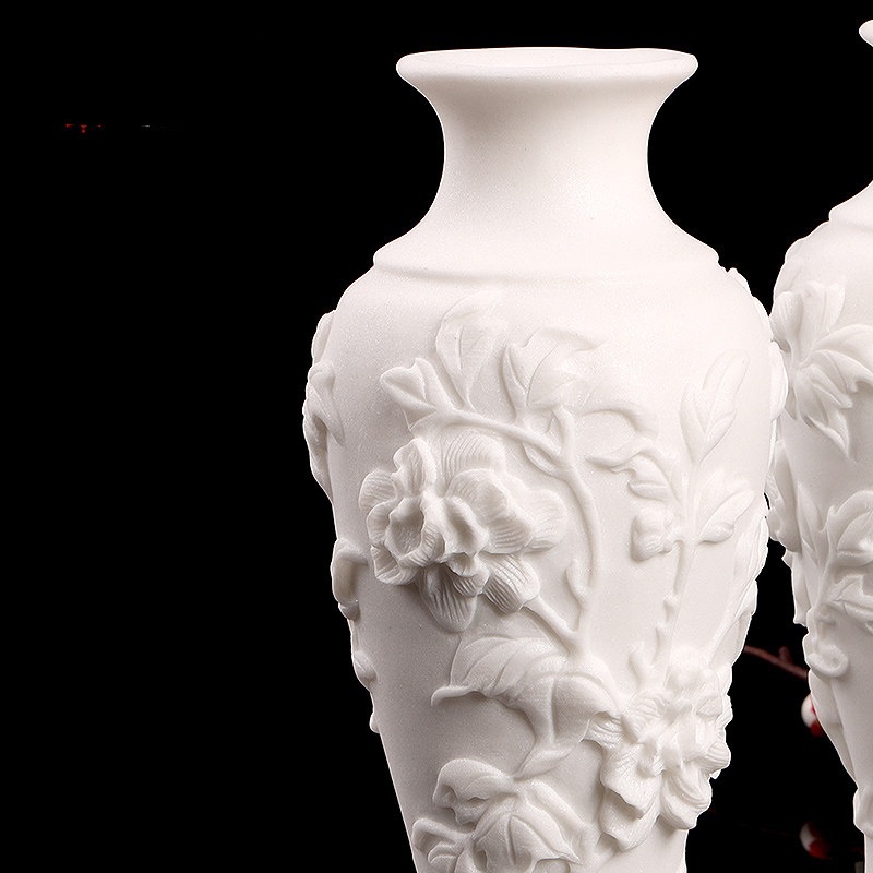 A Pair Of Stone-carved Vases Featuring Peony Motifs In White Marble