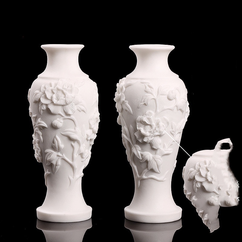 A Pair Of Stone-carved Vases Featuring Peony Motifs In White Marble