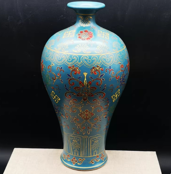 Peacock-Blue Enamel Porcelain Plum Vase With Auspicious Floral Patterns And The Wanshou Longevity Motif