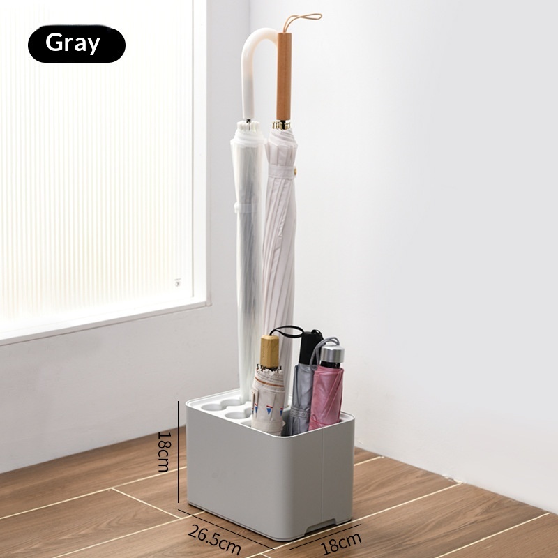 An Umbrella Rack Is Placed In The Lobby By The Office Entrance