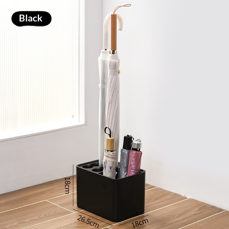 An Umbrella Rack Is Placed In The Lobby By The Office Entrance