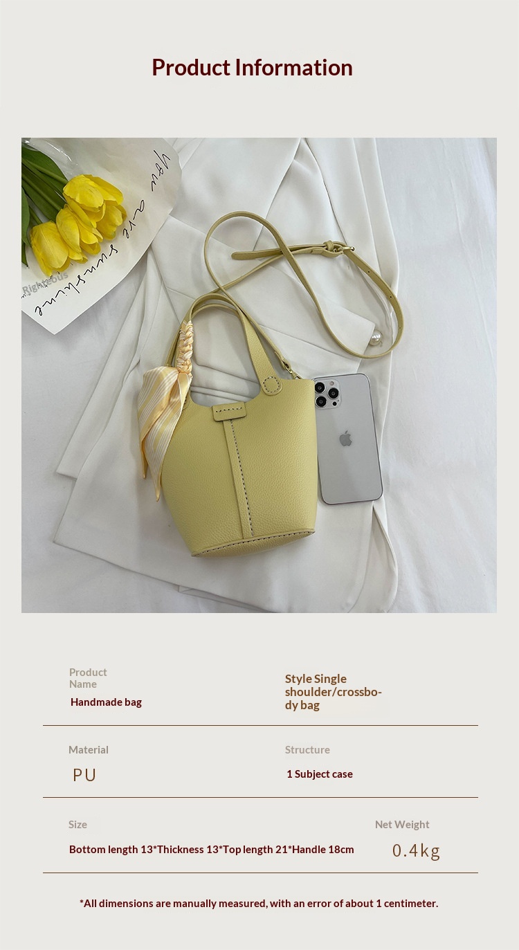 Western-style bucket bag with silk scarf - main view showing lychee grain PU leather texture