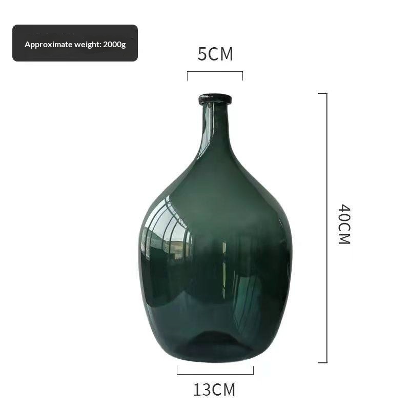Ceramic Nordic Bottle Shaped Handmade Glass Vase With A Large Belly On The Ground