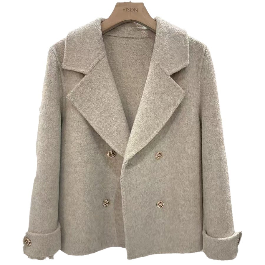 Elegant Women’s Wool Coat with Button Detail and 3 D Pattern Elegant Women’s Wool Coat with Button Detail and 3 D Pattern
