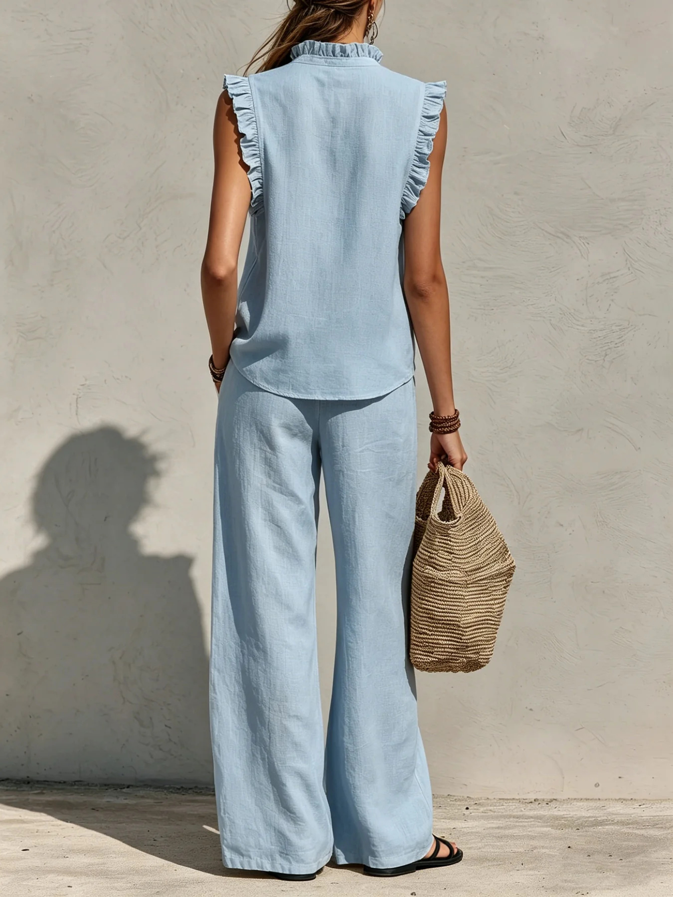 Women's ruffled sleeveless top and wide-leg pants in pink – feminine casual style