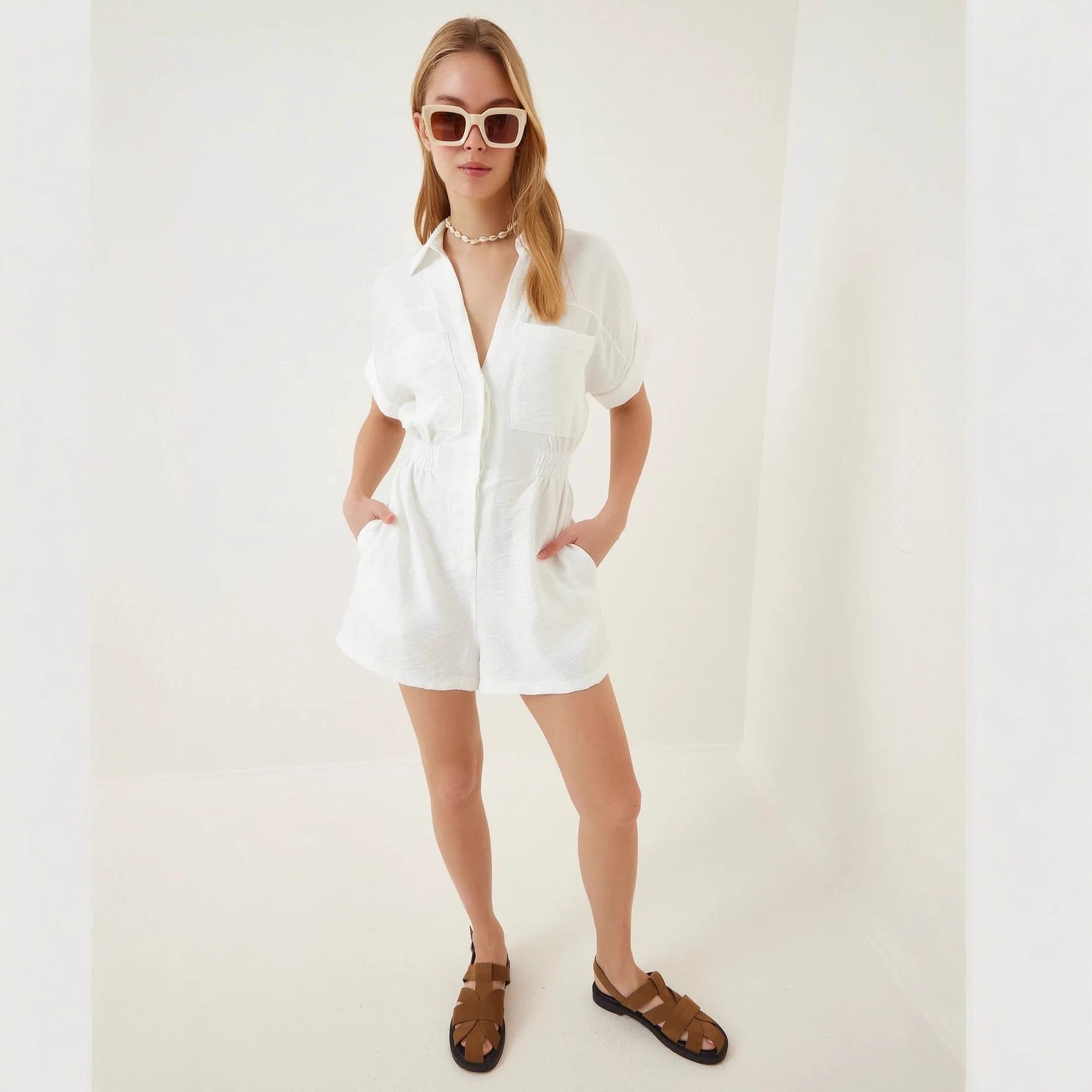 Women's loose-fit jumpsuit – white colorway styled workwear outfit
