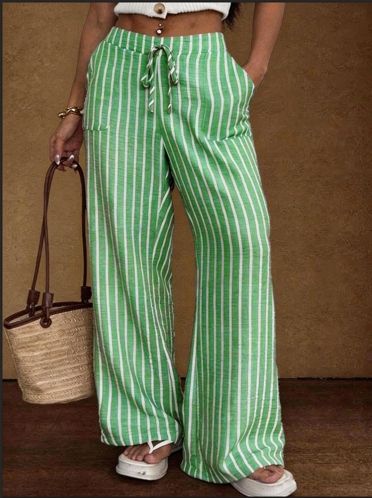 Women's lace-up elastic waist trousers in gray – styled outfit view