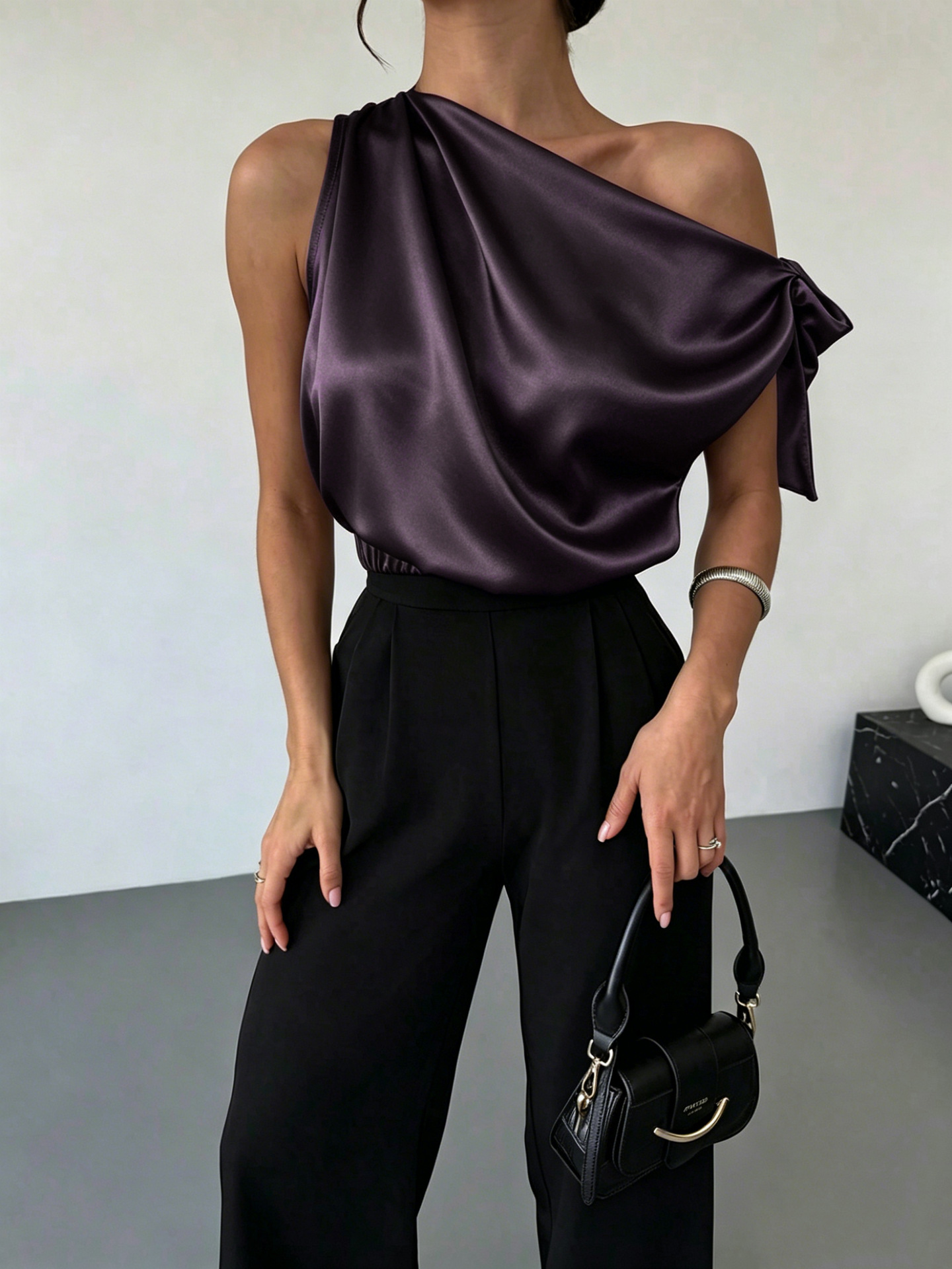 Women's satin off-shoulder bow blouse in Apricot – asymmetrical top styled for date night, front view